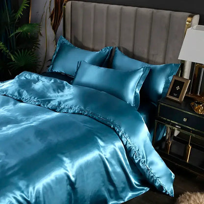 Decorbites™ luxurious silk bedding set in teal satin with glossy finish featuring bed sheet and duvet cover with pillowcases