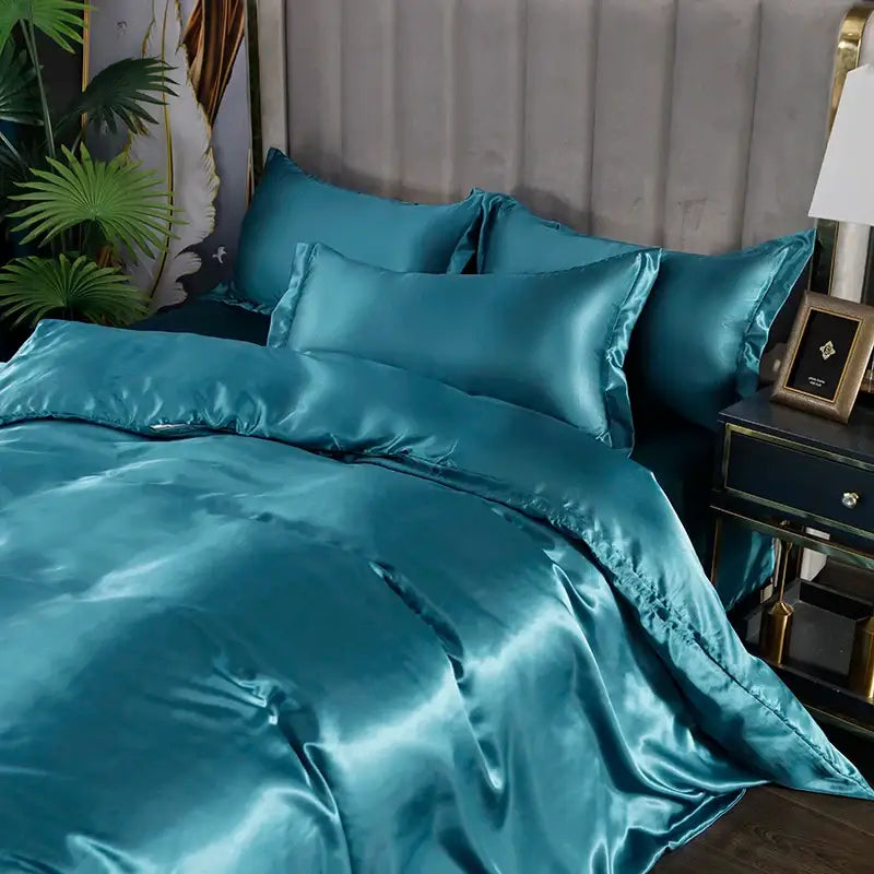 DecorBites™ luxurious silk bedding set in teal satin with glossy smooth texture and matching pillowcases