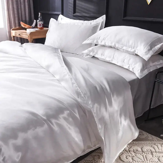 Decorbites™ luxurious silk bedding set featuring white satin duvet cover and matching pillowcases with glossy finish