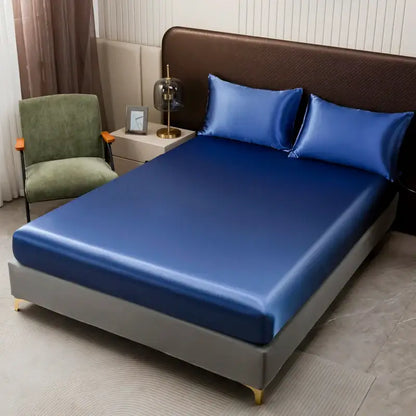 DecorBites™ luxurious blue satin bedding set featuring solid color flat sheet and matching pillowcases