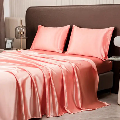 Pink satin solid color bedding set with matching pillowcases and fitted sheet by decorbites luxurious collection