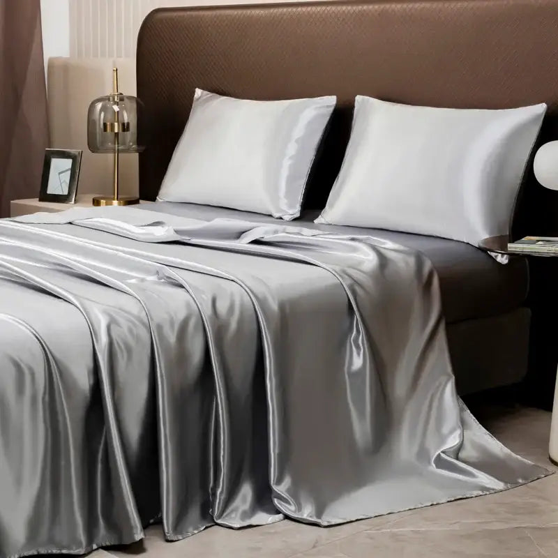 DecorBites™ luxurious solid color satin bedding set with silver flat sheet and matching pillowcases featuring glossy finish
