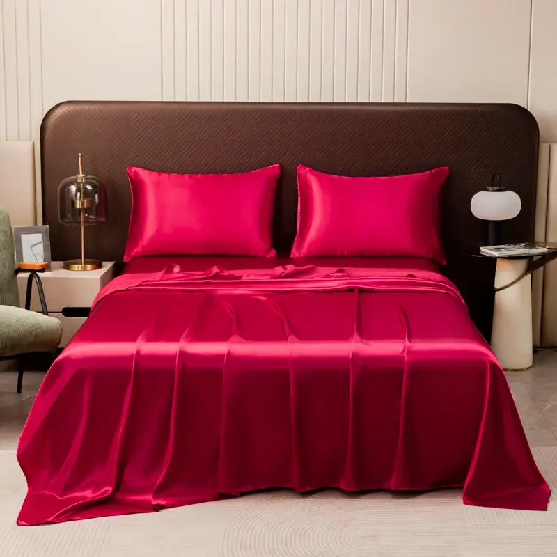 DecorBites™ luxurious solid color bedding set in vibrant fuchsia satin with matching pillowcases and flat sheet