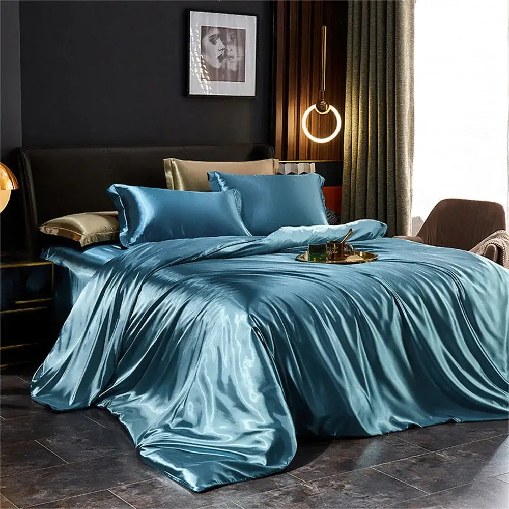 Teal satin pcs duvet cover set with matching pillows featuring a glossy luxurious finish by decorbites silk bedding