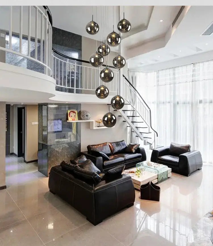 Modern black leather sofa set with plush cushions paired with decorbites™ luxurious spiral led chandelier for home use