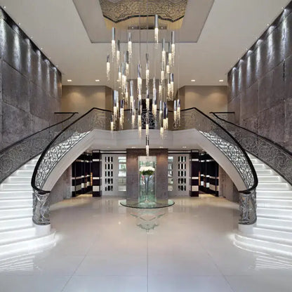 Decorbites™ luxury chrome crystal led chandelier with cascading cylindrical glass and metallic elements for staircase
