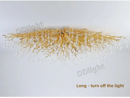 DecorBites luxury crystal chandelier with gold-toned branch-like arms and clear crystal droplets for elegant home decor