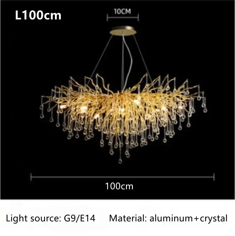 Gold-toned luxury crystal chandelier with branching twig design and dangling crystal droplets for home decor by decorbites
