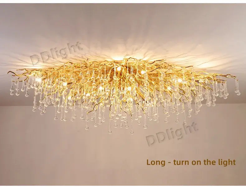DecorBites™ luxury crystal chandelier with golden branch design and dangling crystal droplets for home decor