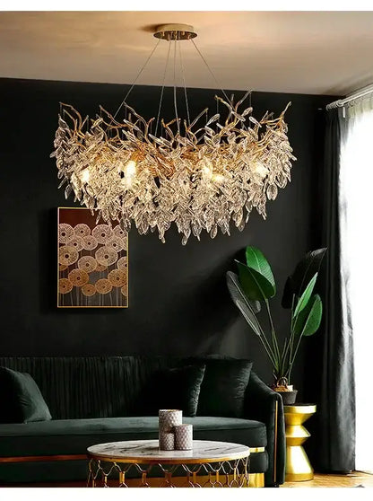 Gold-toned DecorBites luxury crystal chandelier with intricate leaf and crystal design for living room lighting