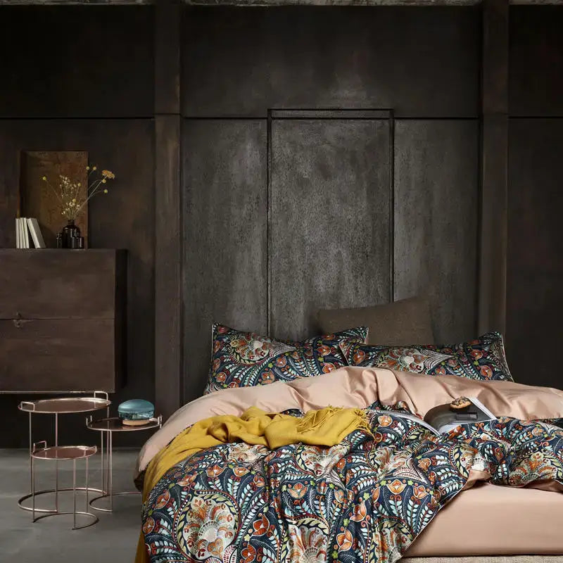 The DecorBites™ luxury Egyptian cotton duvet cover set features a richly patterned paisley design in navy rust and cream