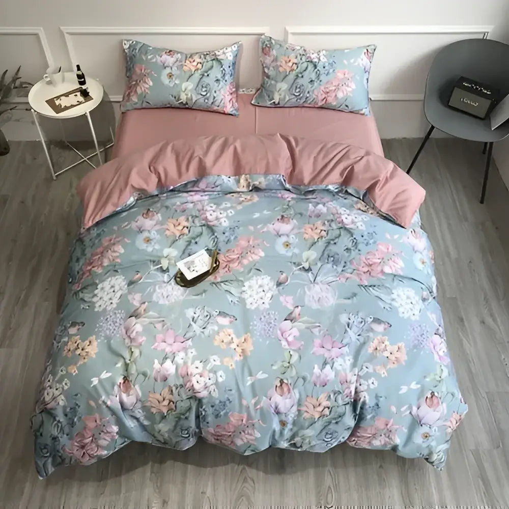 Pastel blue floral duvet cover set with pink accents in egyptian cotton featuring pillowcases from decorbites luxury bedding