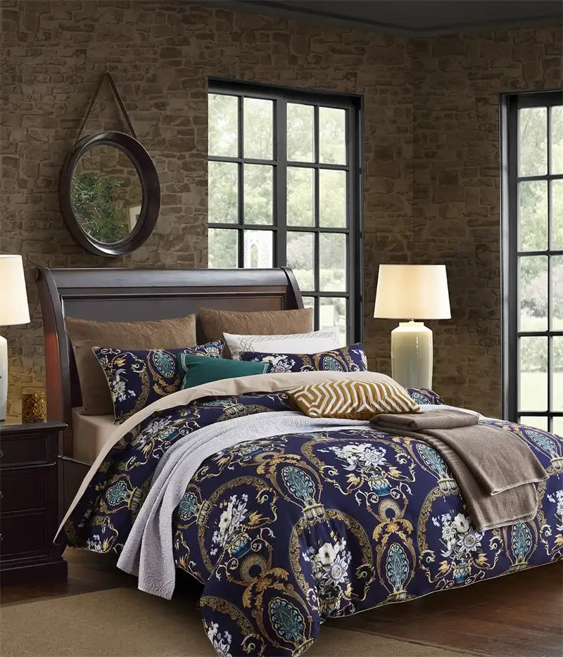 Navy blue quilted duvet cover set with gold and teal floral paisley patterns made from luxury Egyptian cotton