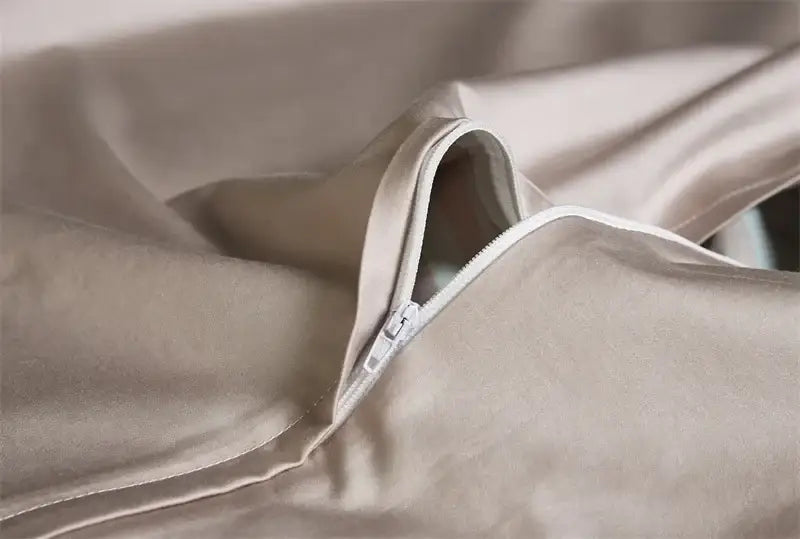 Beige satin duvet cover with subtle sheen and white zipper closure from decorbites luxury egyptian cotton bedding set