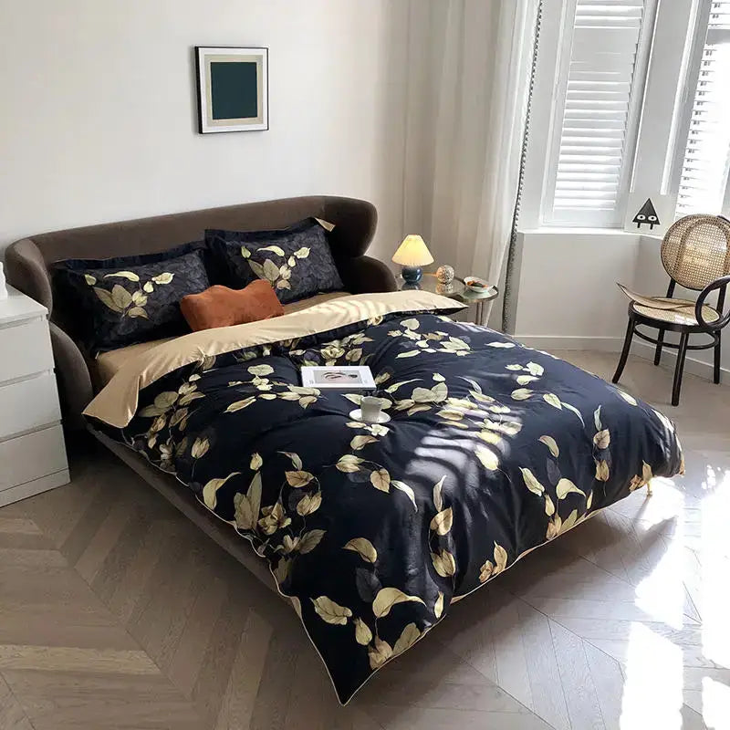 Elegant navy blue cotton duvet cover and pieces pillowcases with gold leaf pattern and tan inner lining from DecorBites™ luxury set