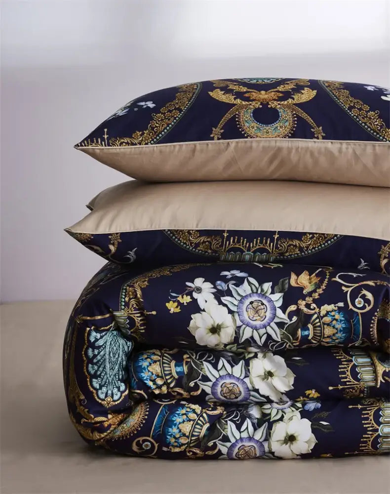 Dark blue quilt with intricate gold and white floral patterns in decorbites™ luxury flamingo leaf duvet cover cotton set
