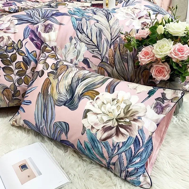 Pink pillow with detailed blue white and purple floral pattern from decorbites luxury flamingo leaf cotton duvet cover set