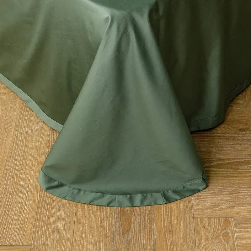Olive green satin tablecloth with subtle sheen and finished hem paired with DecorBites Luxury duvet cover set