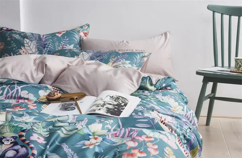 Teal satin duvet cover with vibrant tropical floral and monkey print from decorbites luxury flamingo leaf bedding set cotton