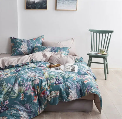 Teal and white botanical print duvet cover set with pillowcases in soft cotton fabric by DecorBites luxury collection