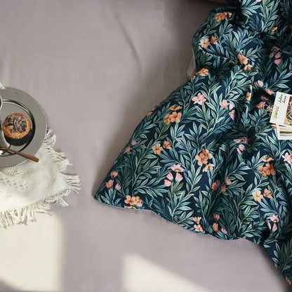Decorbites luxury flamingo leaf duvet cover and pillowcases set in dark teal with vibrant pink floral botanical print