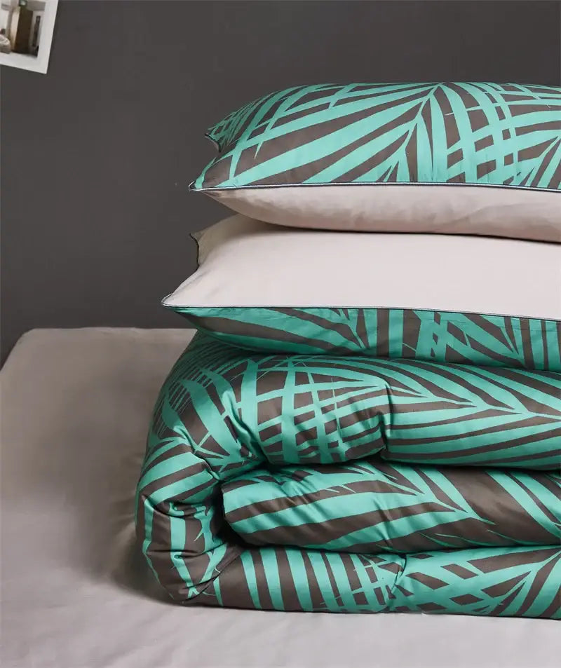Stacked DecorBites™ luxury flamingo leaf bedding set with teal and gray satin duvet cover and two pieces pillowcases 48*74cm
