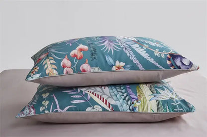 Teal floral-patterned pillow with soft fabric and subtle stitching details in decorbites luxury flamingo leaf duvet cover set pieces pillowcases 48*74cm