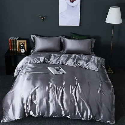DecorBites™ luxury mulberry silk bedding set in silver satin with matching pillows and smooth duvet cover texture
