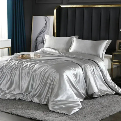 Decorbites™ luxury mulberry silk duvet cover set in silver satin with matching pillowcases and a smooth sheen texture