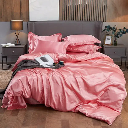 Decorbites luxury rayon satin pink bedding set with glossy finish and matching pillows for twin queen king width bed