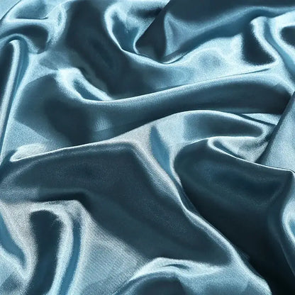 Teal satin duvet cover from decorbites luxury silk bedding set with smooth glossy finish and flowing folds