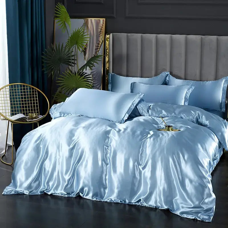 Light blue DecorBites luxury silk pcs duvet cover set with a glossy satin finish and matching pillows