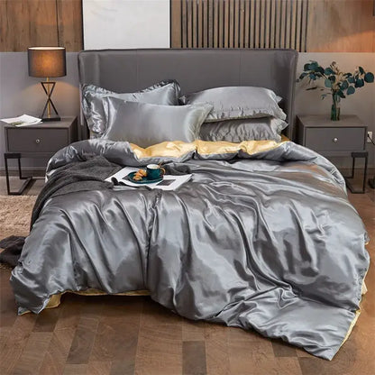 Decorbites luxury solid color pcduvet cover set in silver satin with gold inner lining and matching pillows for width bed