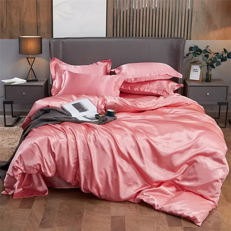 Pink satin pcduvet cover bedding set with glossy finish and matching pillows for twin queen king width bed