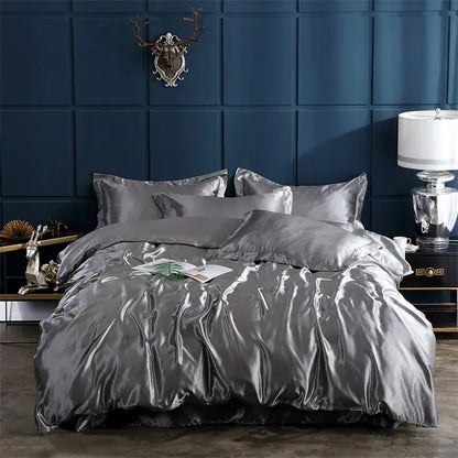 Silver satin pcduvet cover set with matching pillowcases featuring solid color and elegant draping for width bed sizes