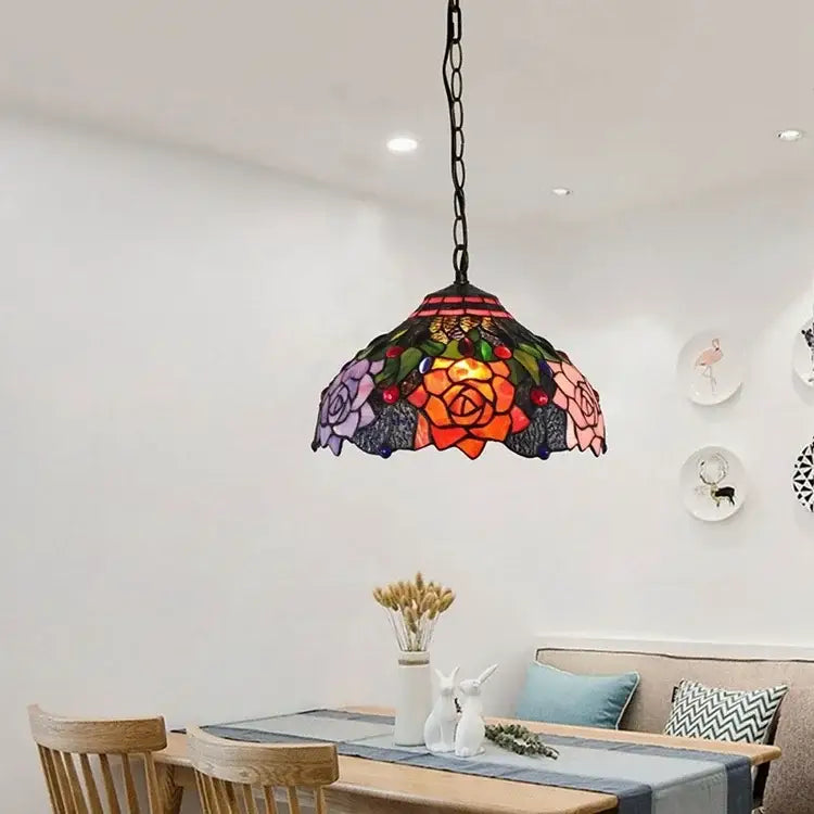 A vibrant multi-colored glass pendant floral design stained glass pendant light by DecorBites luxury Tiffany style