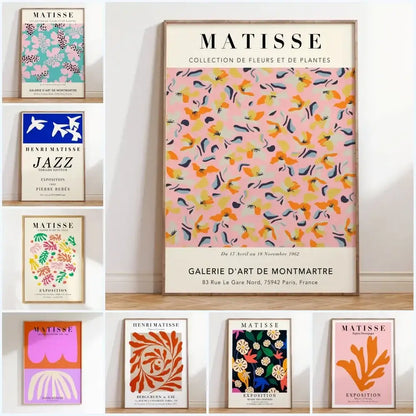 A framed decorbites™ matisse floral art print featuring vibrant pink background with bold orange yellow and black flowers