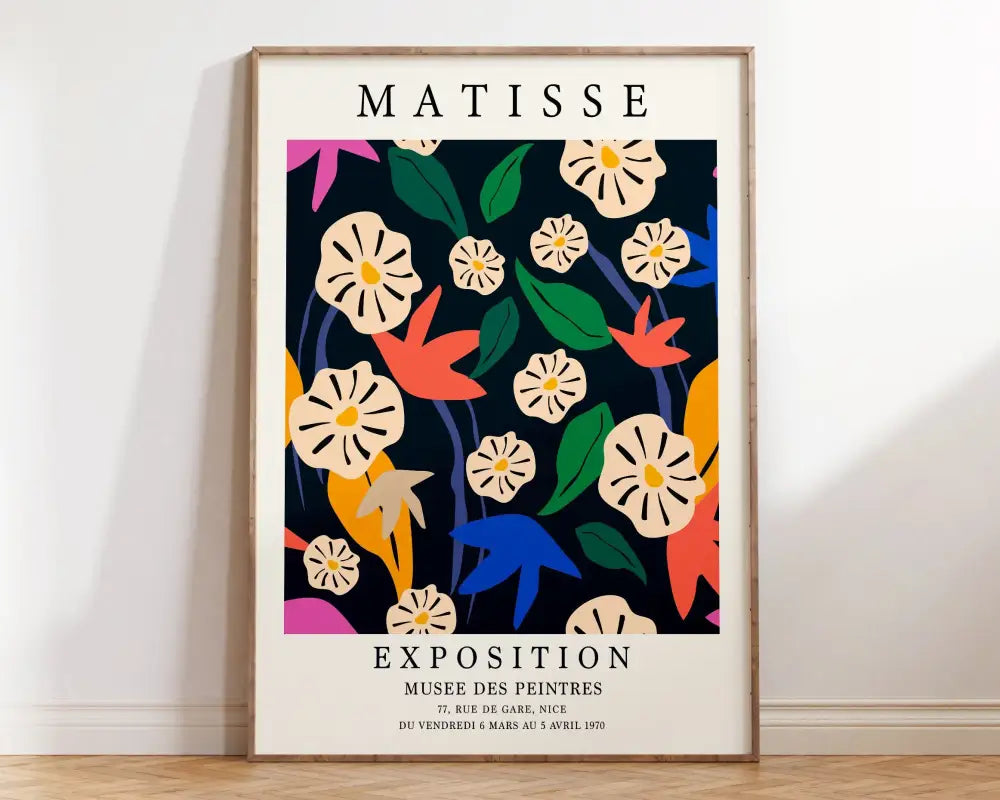 A framed DecorBites™ matisse floral art print with vibrant cream green orange blue and pink flowers on dark background