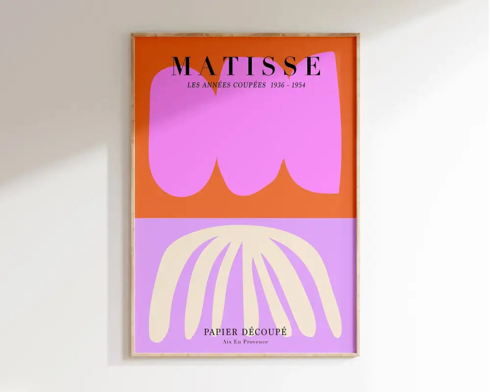 A framed DecorBites™ matisse floral art print featuring bold abstract cut-paper art in vibrant orange and lavender hues