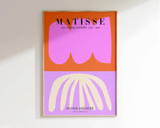 A framed poster of decorbites™ matisse floral art featuring bold abstract cut-paper floral art prints in orange and lavender hues