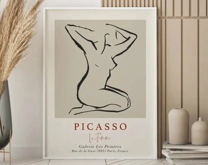 Minimalist framed art print with black line nude figure on beige background titled decorbites™ matisse floral canvas prints