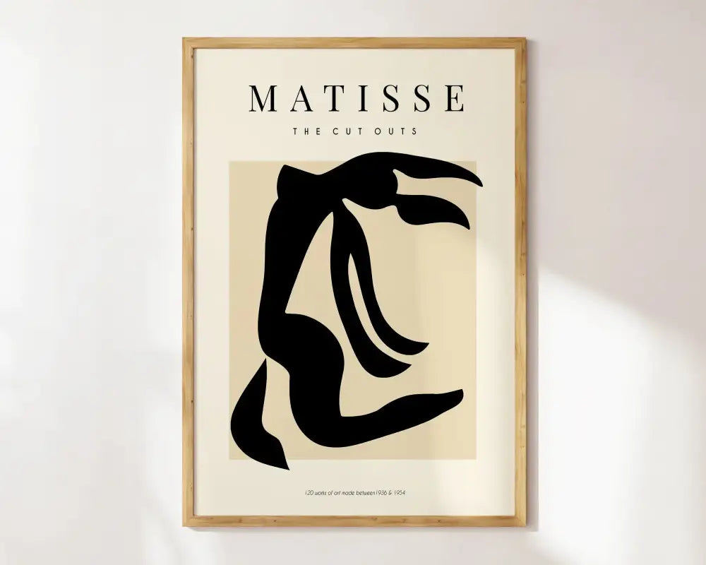 Minimalist framed art print of a bold black female silhouette with matisse floral text on an off-white abstract flowers canvas