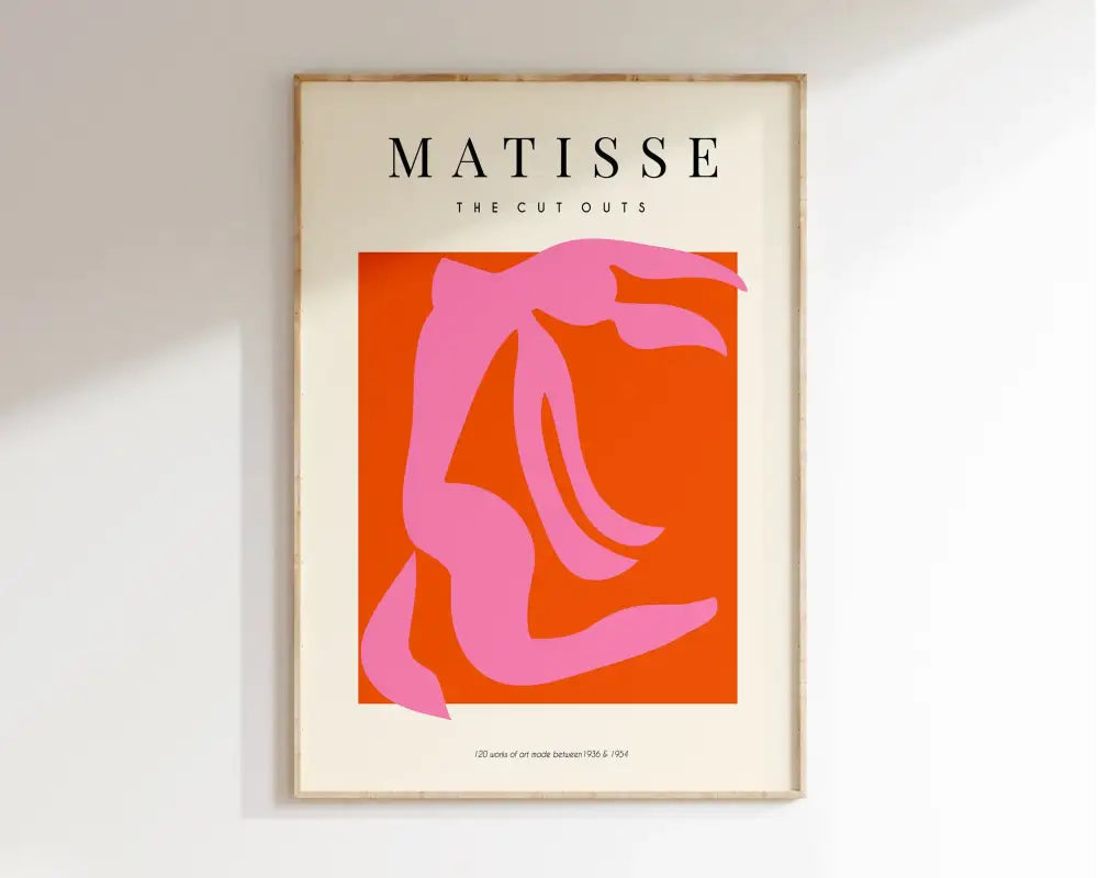 Framed decorbites™ matisse floral print with bold pink silhouette on orange background featuring vibrant colors and text details