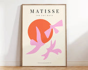A framed DecorBites™ Matisse flower market poster with bold pink and orange abstract flowers on cream background