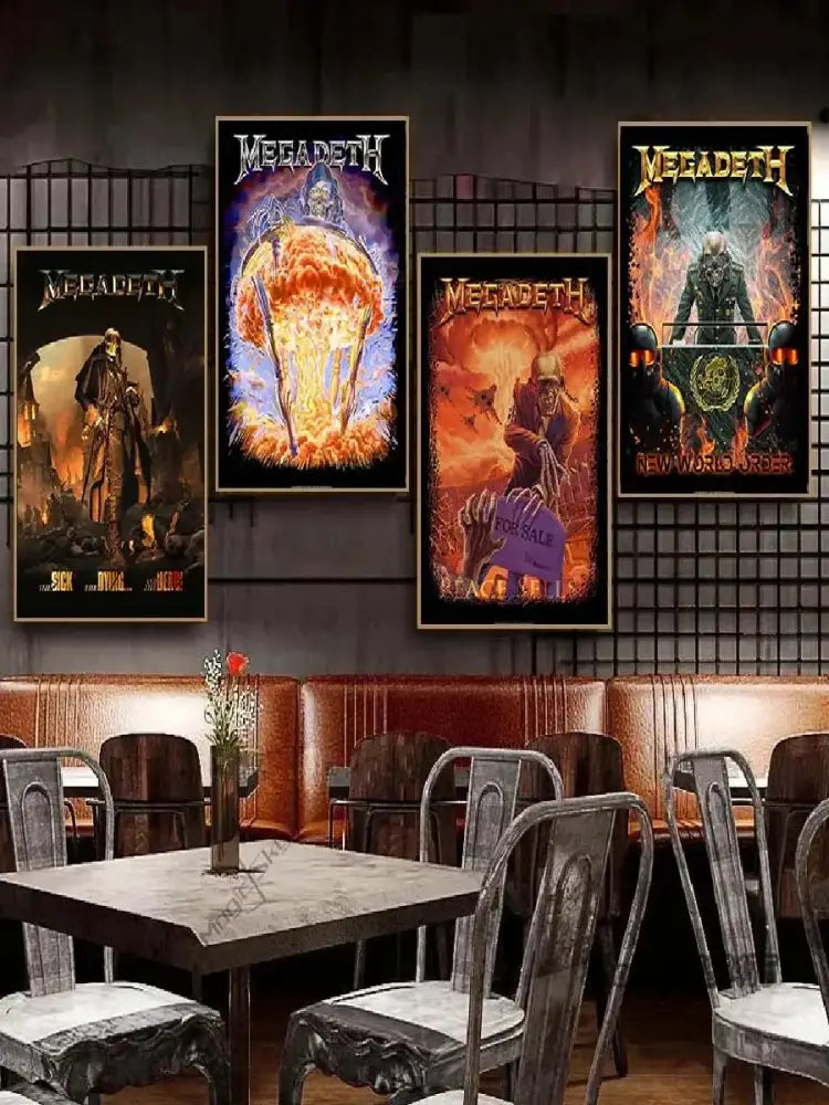 Four framed megadeth canvas posters with dark fiery artwork and black borders as rock music wall art above leather booths