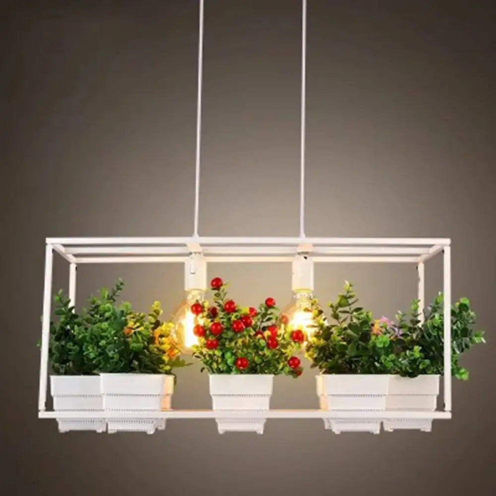 White metal 2-head rectangle pendant light fixture with three bulbs, integrated planters with artificial bonsai and red berries