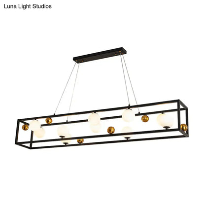 Black metal rectangular chandelier with gold spherical accents and milk glass shade for industrial dining rooms