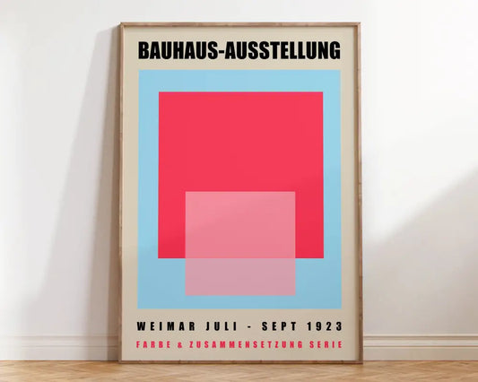 Minimalist mid century canvas print with bold red and pink geometric shapes for modern home decor by decorbites