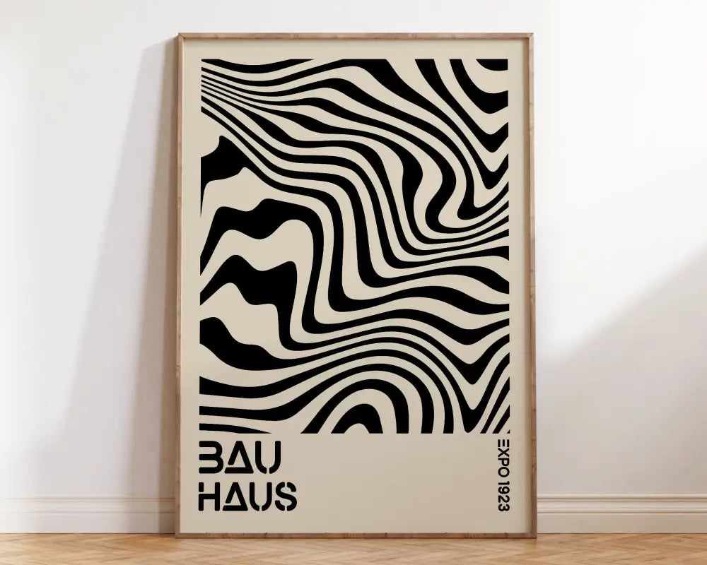 A minimalist mid century wall art canvas with bold black and cream wavy stripes and bau haus text for home decor
