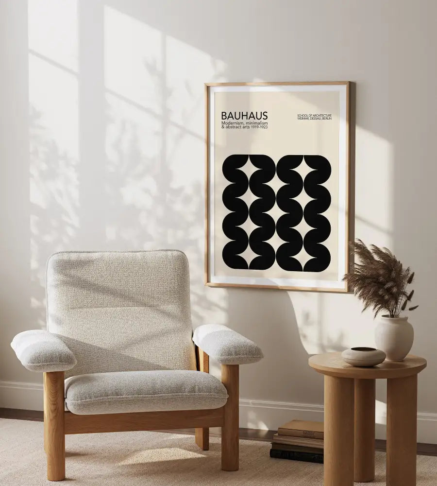 Beige upholstered armchair with wooden legs and arms beside decorbites mid century geometric wall art canvas prints